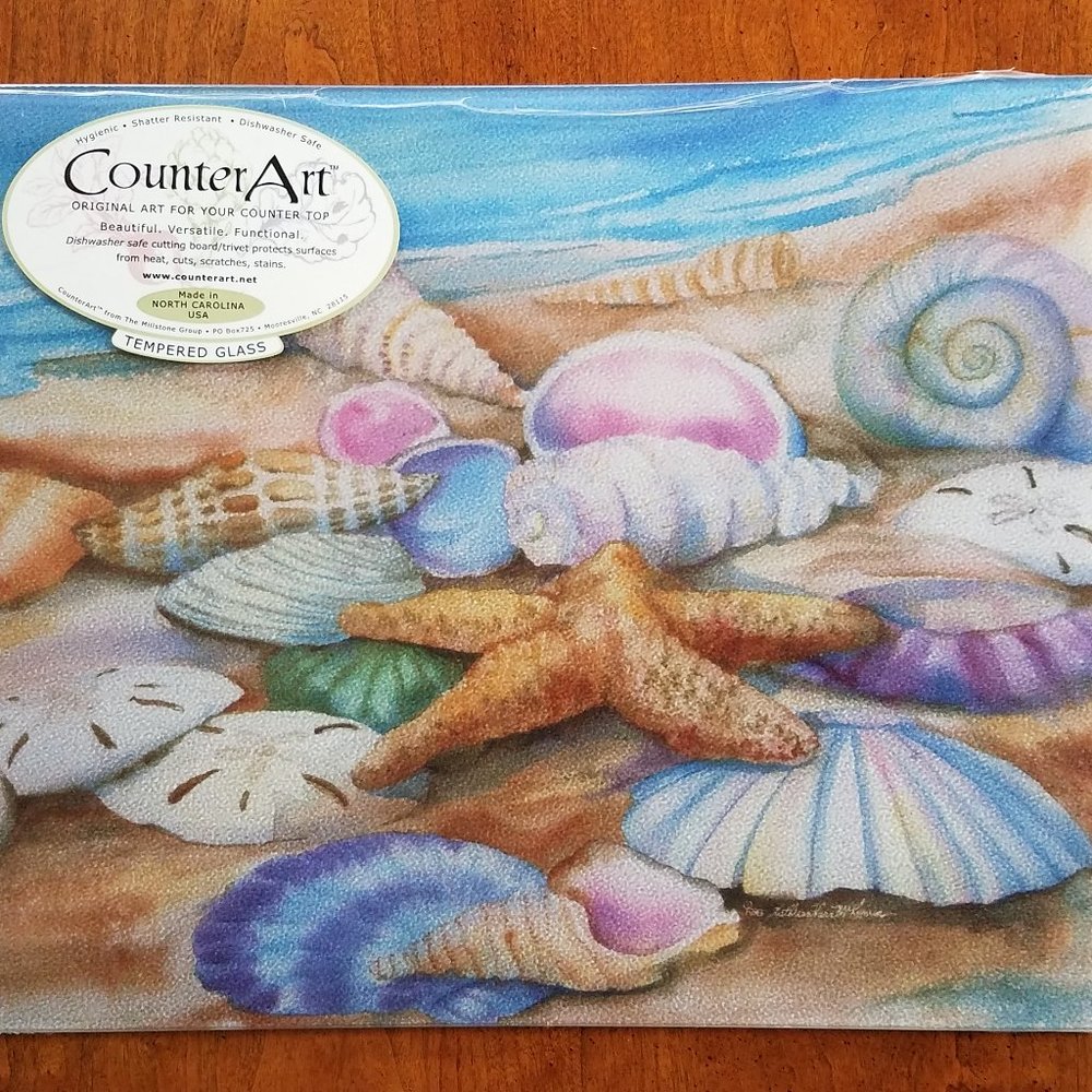 NIB Tempered Glass Cutting Board/Trivet with Beach Motif (Seashells on Sand)